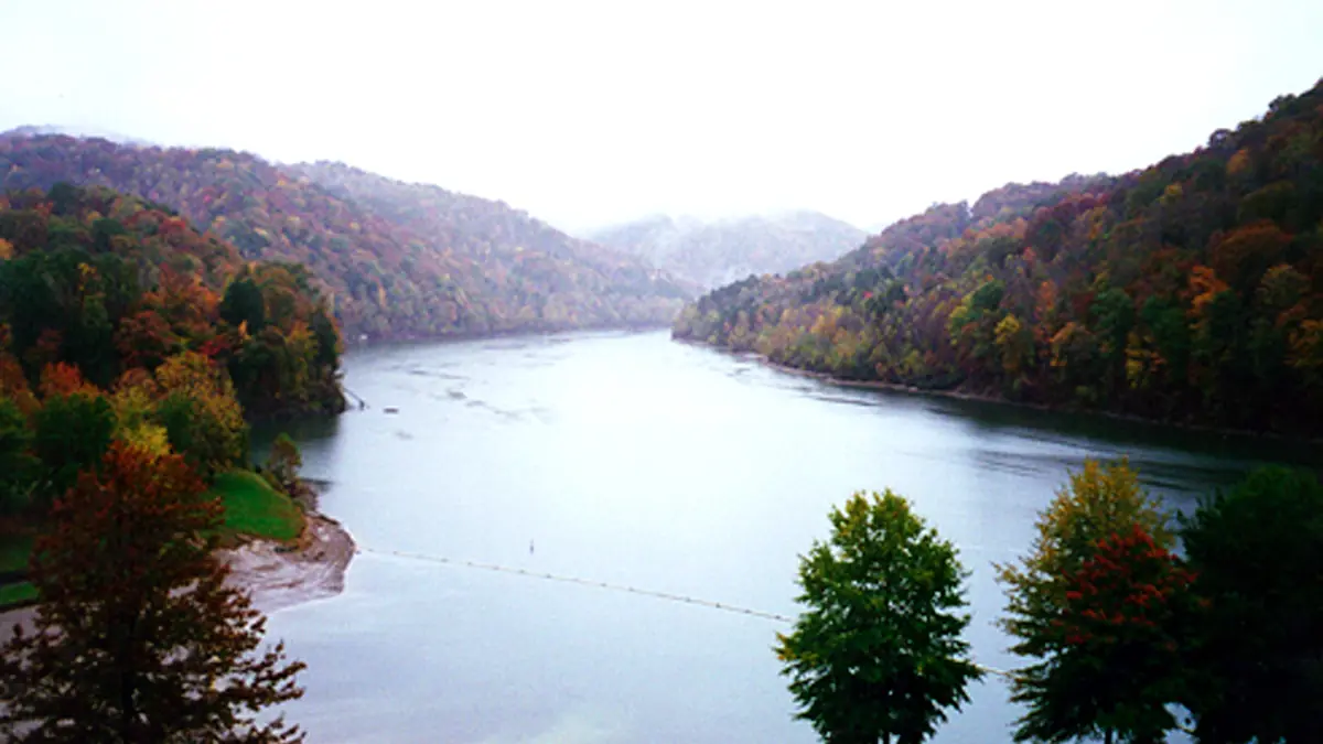 Nolin River Lake winding between wooded hills in fall color, Kentucky